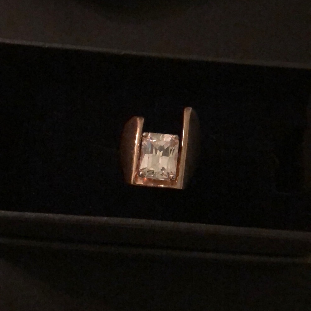 18k gf.  Unique Cz solitaire.